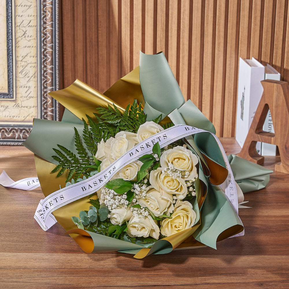 12 White Roses with Ruscus and Ferns in Floral Wrap – the bouquet