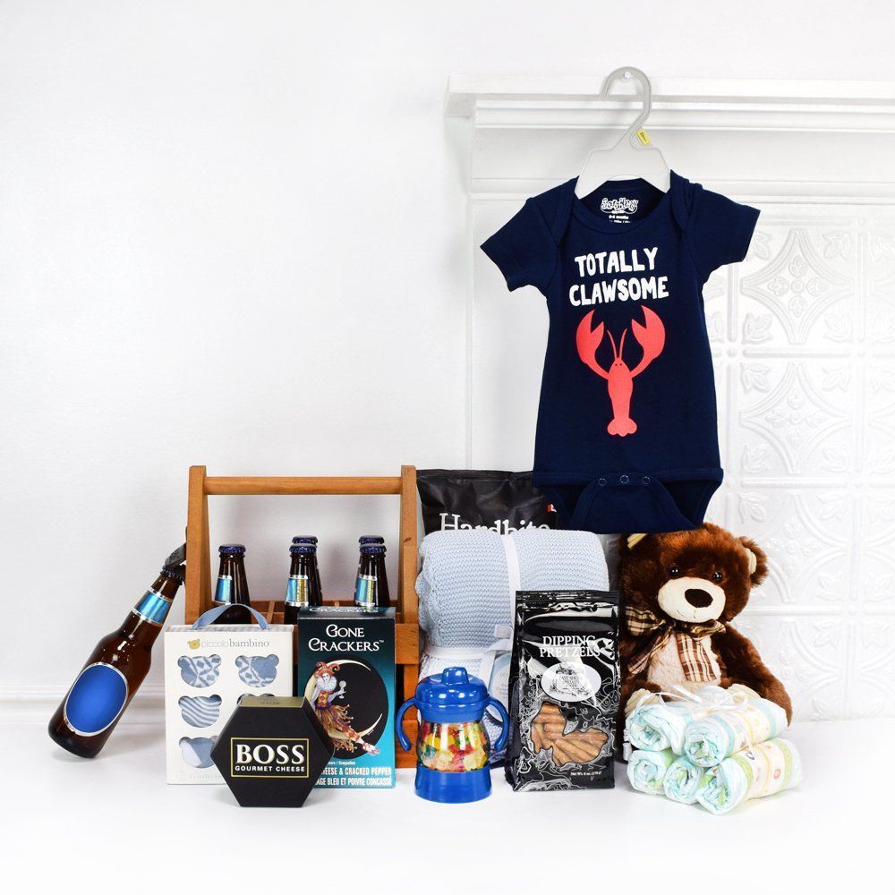 This thoughtful gift set includes a range of items, from adorable baby apparel and blankets to delicious snacks and refreshing beers for the proud parents, Montreal delivery 