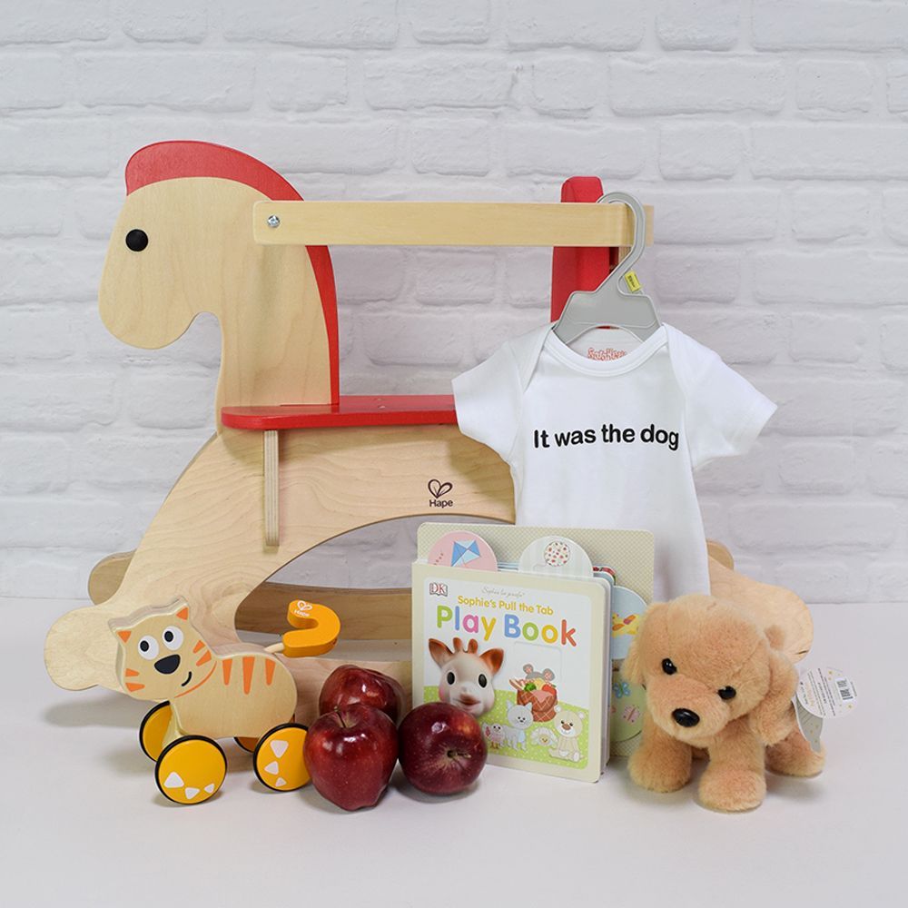 "Rock &amp; Roll Baby Gift Basket" Rocking Horse, Baby Onesie, Apples, Furry Toy, and a Playbook from Montreal Baskets - Montreal Delivery